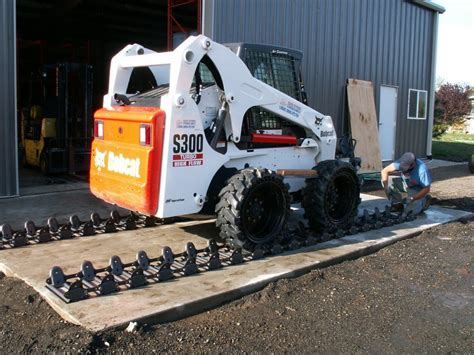 running a tracked skid steer on rocks|aftermarket tracks for skid steer.